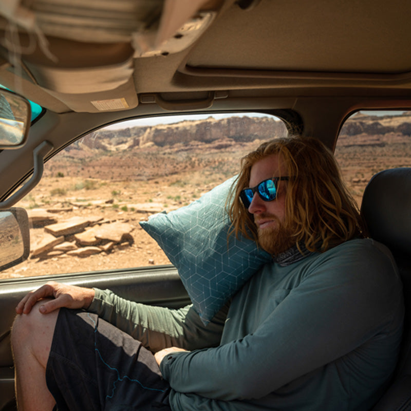 Klymit_Coast_TravelPIllow_Teal_12CTBL01C_LS02_2998x2000_c950d6b8-e66a-48d0-a84b-319692e53042.jpg