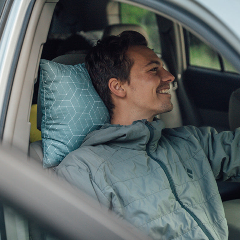 Klymit_Coast_TravelPIllow_Yellow_12CTYL01C_LS04_2994x2000_10194bff-3889-4ee1-bc85-f22a73fed6db.jpg