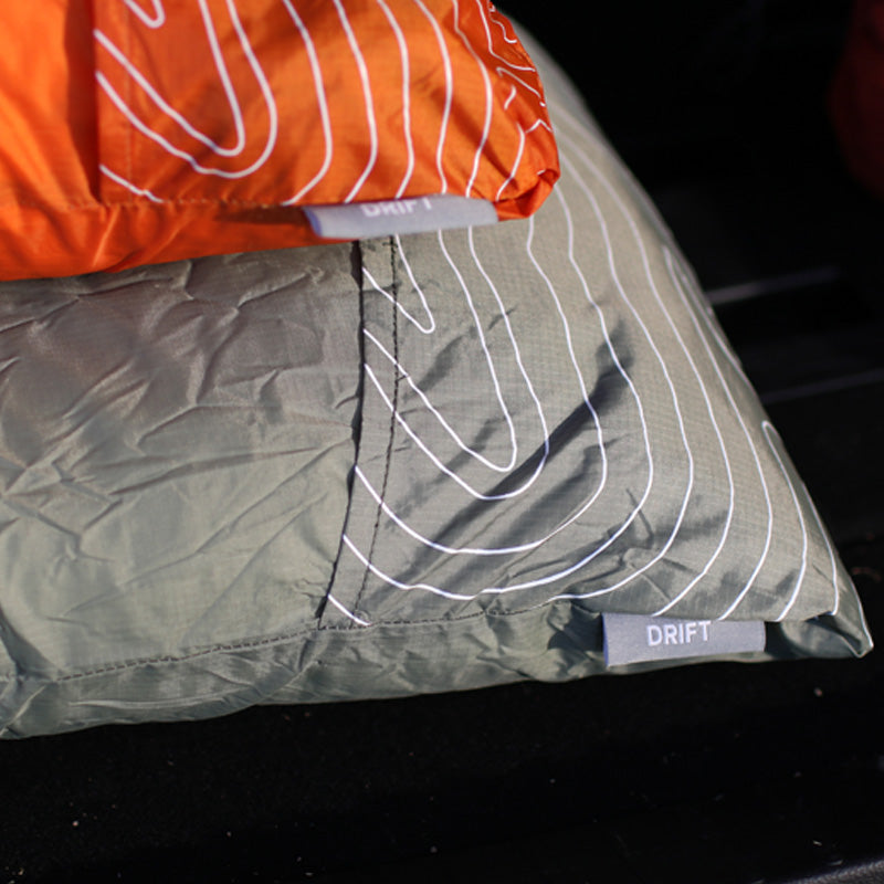 Klymit_DriftPillow_LG_Green_12DRGR01D_LS09_RegOrange_2000x1333_2000x1333_6301cb3d-cd8e-4847-844d-f93c2b4635c9.jpg